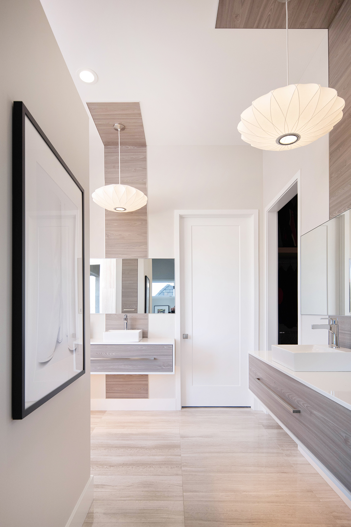 Contemporary Coastal Primary Bathroom Contemporary coastal primary bathroom with floating wood vanity and white quartz countertop