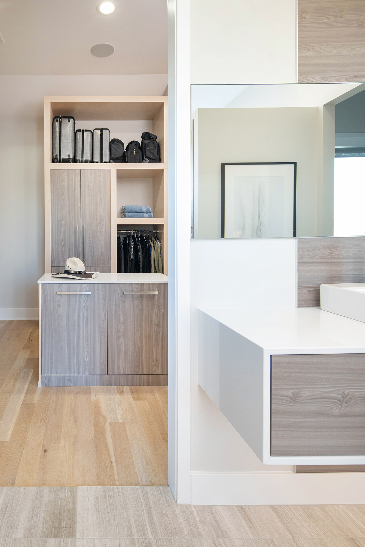 Custom Walk-In Closet Custom walk-in closet with dedicated his-and-her storage areas