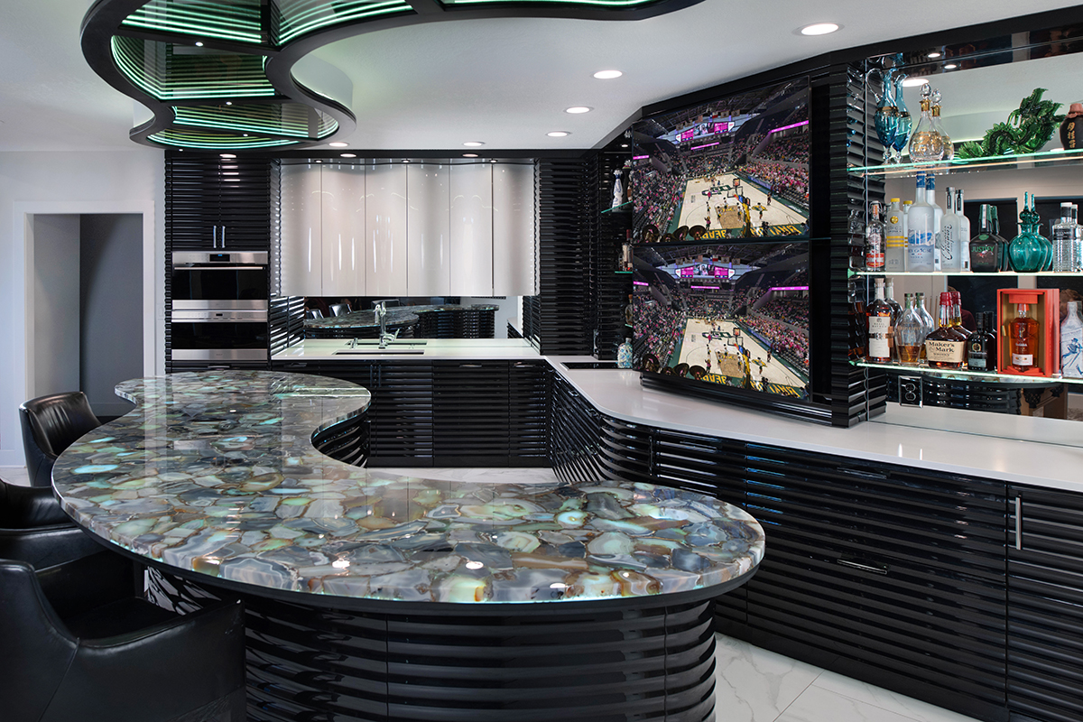 Kleweno custom basement bar and wine cellar Luxury lower-level entertaining space designed for hosting family and friends