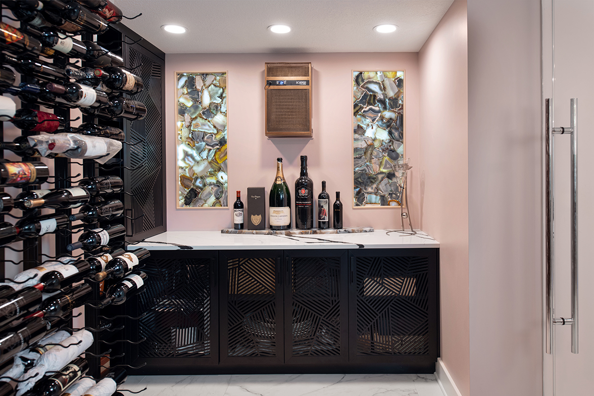 Kleweno custom basement bar and wine cellar Built-in beverage center with custom cabinetry and luxury appliances